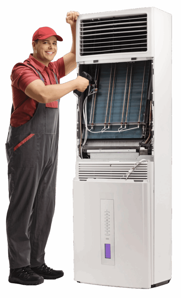 A male technician in a red shirt and cap stands next to an opened vertical air conditioning unit, smiling. He is holding a tool, inspecting the internal components of the air conditioner, which has visible coils and a fan inside.